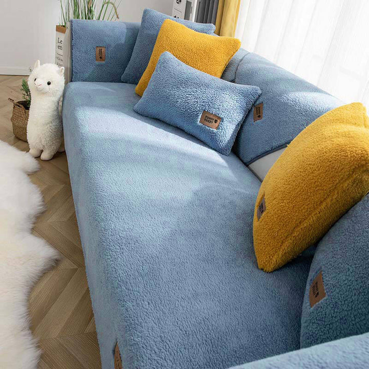 White waterproof sherpa fleece sofa cover, non-slip, offering cozy and clean protection for pet owners