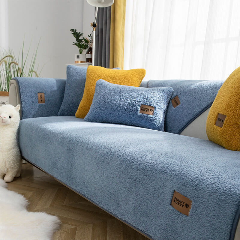 Cozy sherpa fleece couch cover for pet owners, waterproof and non-slip design, machine washable