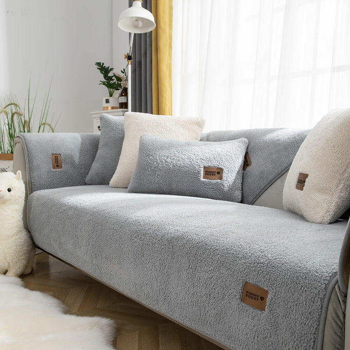 Sectional sofa protector with waterproof sherpa fleece, featuring anti-slip backing for pet safety