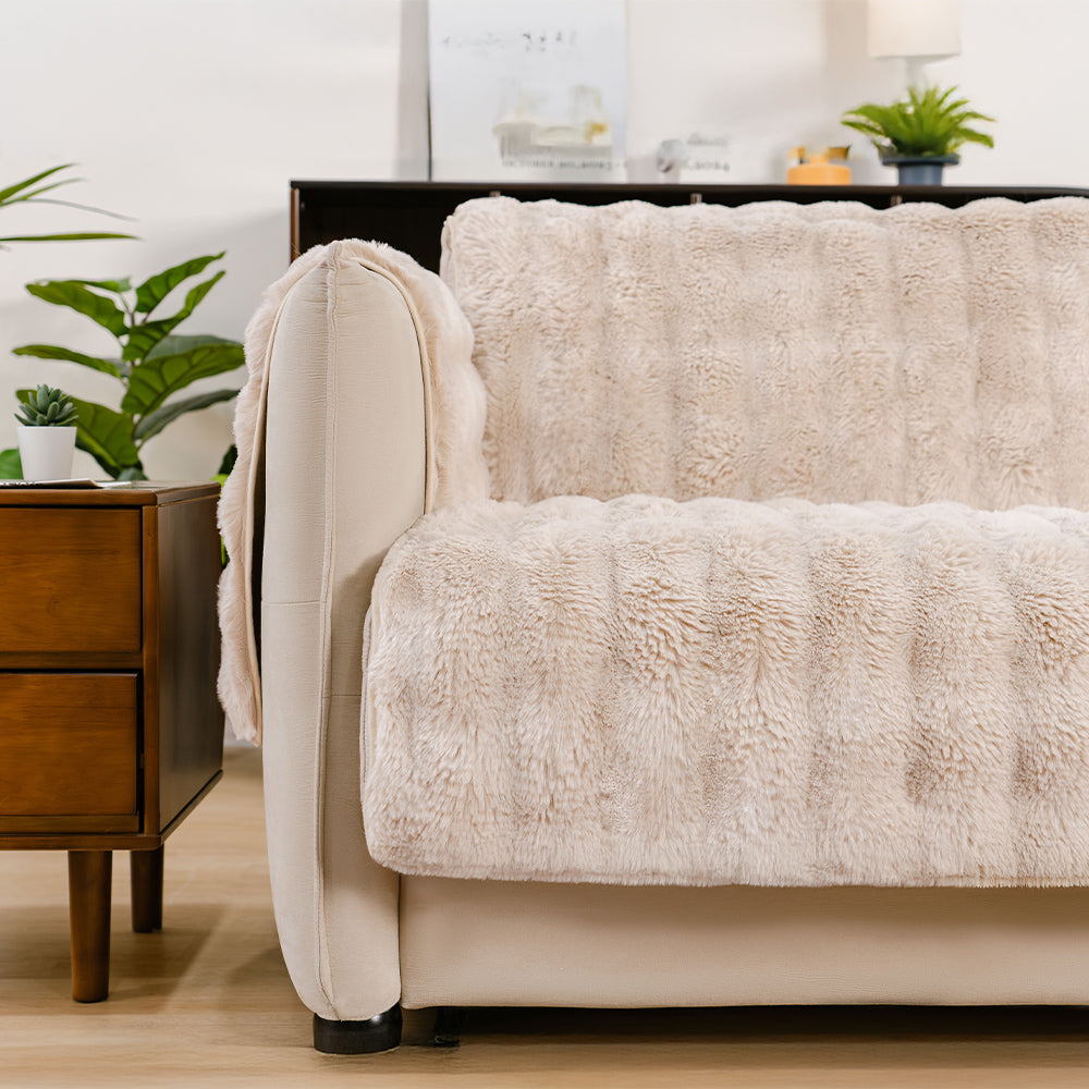 Black waterproof fluffy sofa protector, sleek and pet friendly, for modern living rooms.