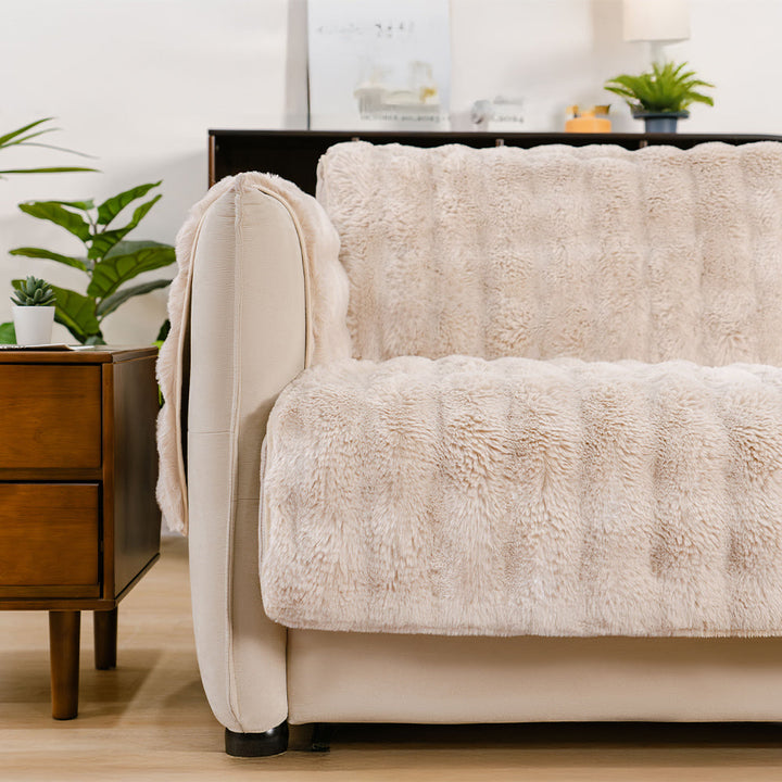 Black waterproof fluffy sofa protector, sleek and pet friendly, for modern living rooms.