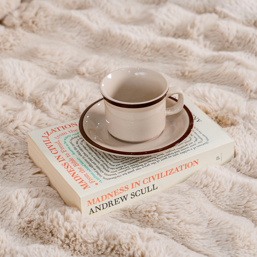 Detail shot of the stitching on a waterproof fluffy couch cover, high quality and durable.