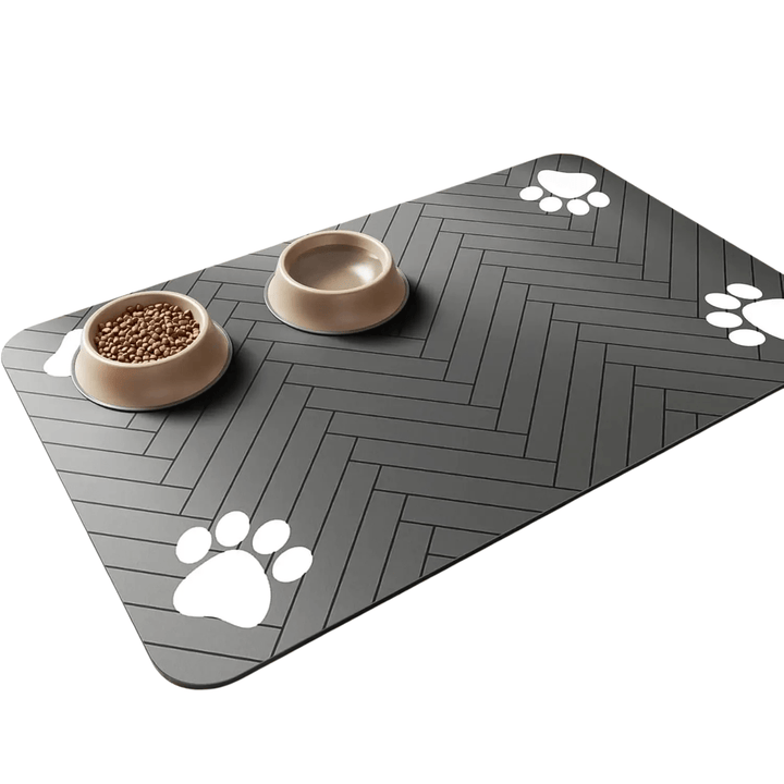 Waterproof non-slip pet feeding mat in gray, protecting floor from dog and cat food spills and water.