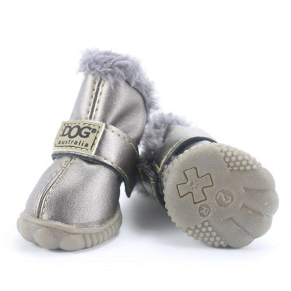 Waterproof outdoor dog boots, black, protecting paws on a wet trail, durable pet supplies.