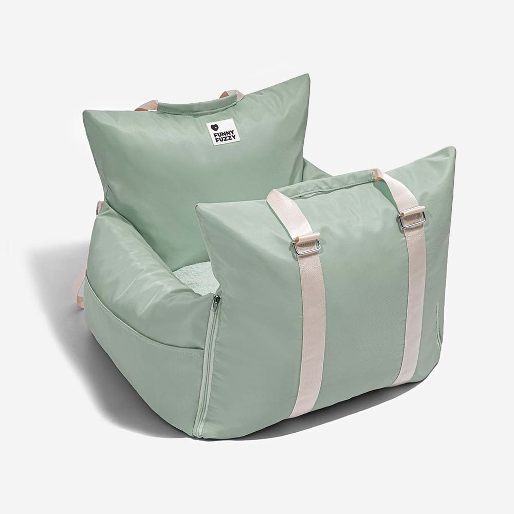 Waterproof pet travel bed with seat anchors for secure placement