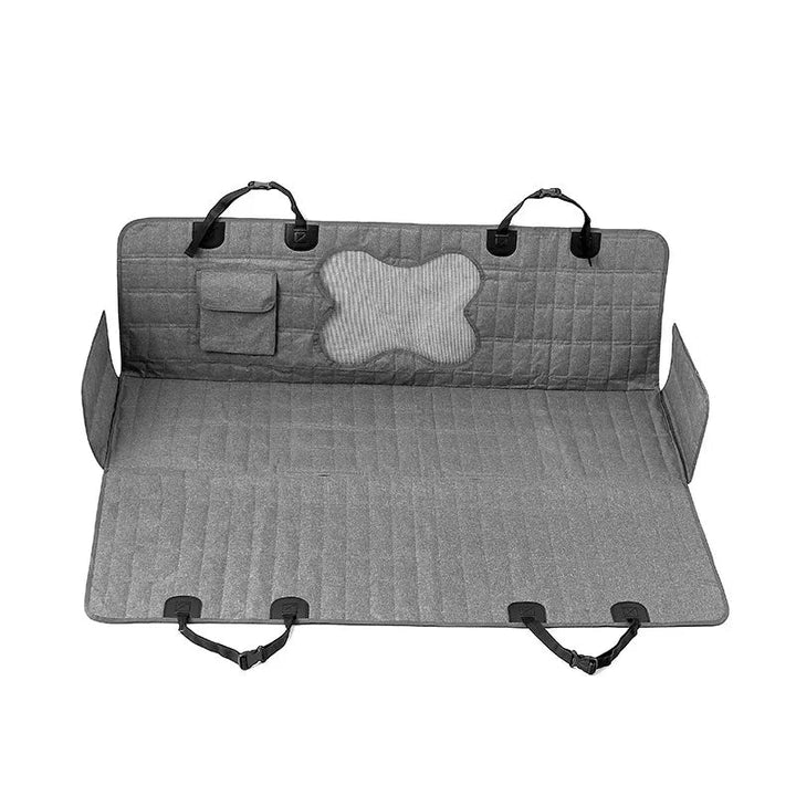 Close-up of the waterproof fabric on a pet car seat cover, highlighting its durability for auto pet travel.