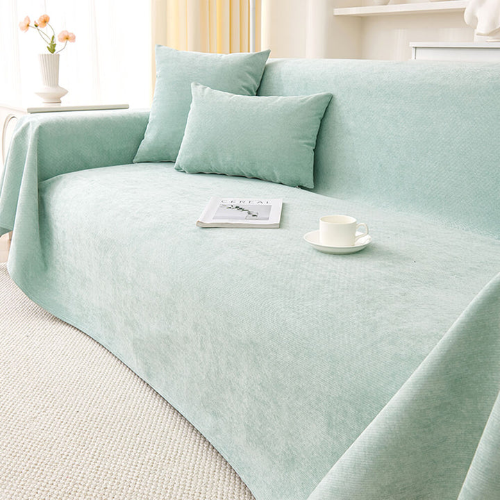 Side view of a couch with a fitted non-slip waterproof pet-friendly scratch-resistant sofa protector