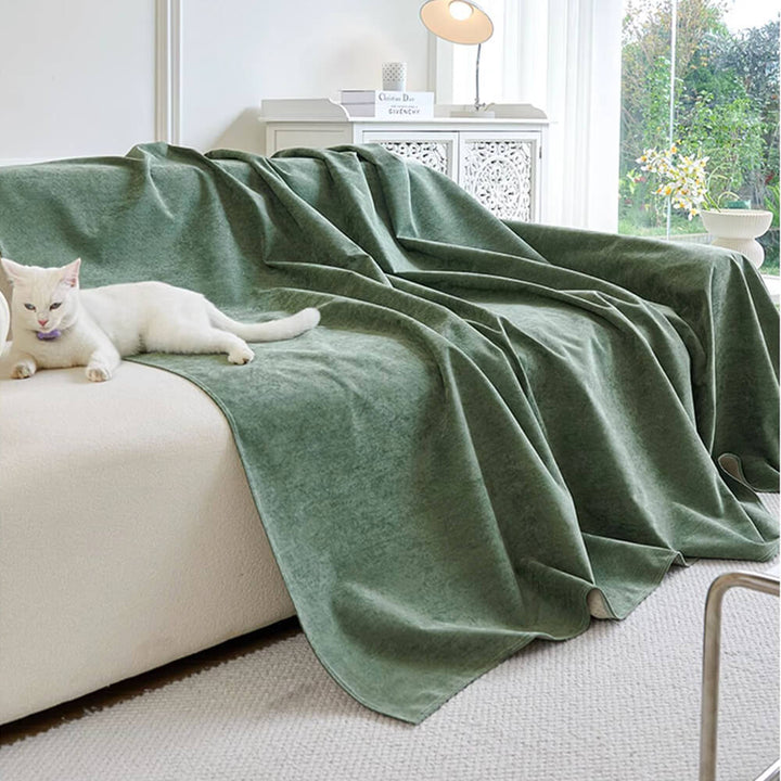 Beige waterproof pet-friendly couch throw cover draped over a sofa, enhancing home decor