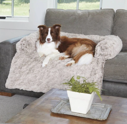 Folded waterproof dog blanket with plaid pattern, ready for use or storage