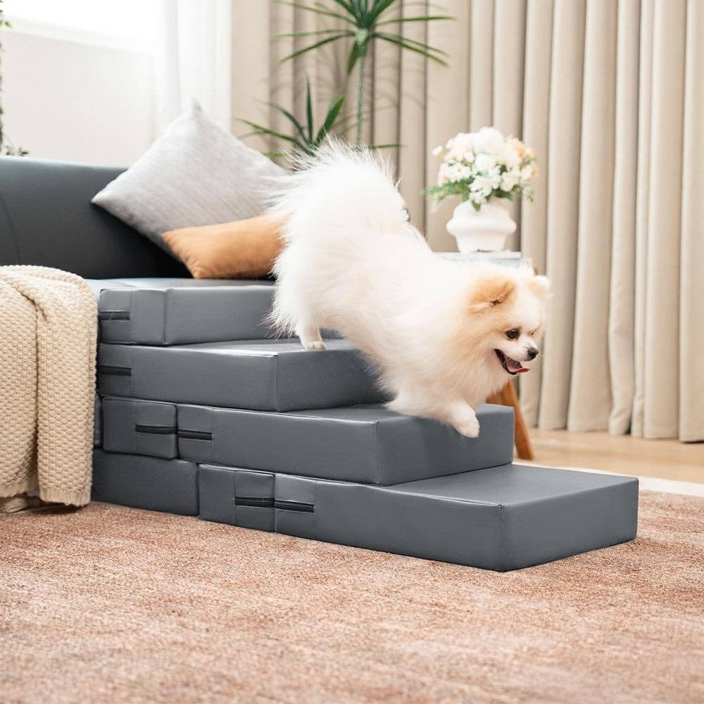 Senior dog easily navigating adjustable PU leather pet stairs, providing hip and joint support