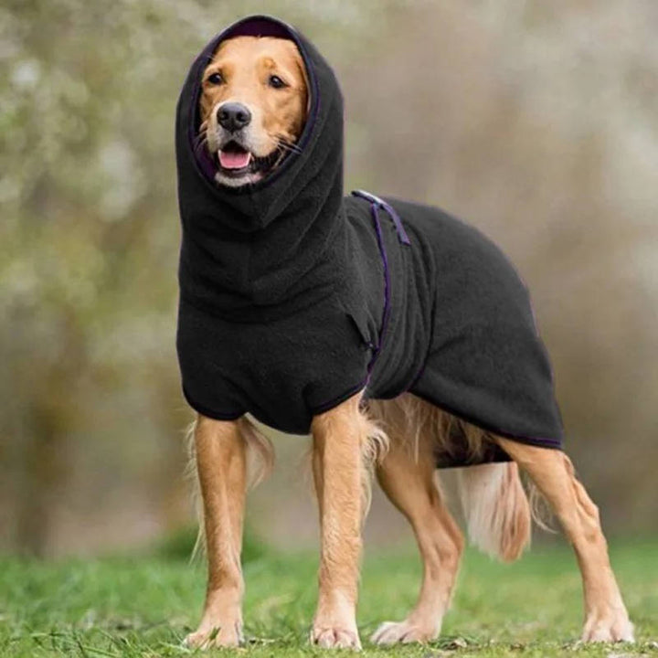Warm waterproof dog jacket in blue, designed for winter. Reflective outdoor dog gear for safety.