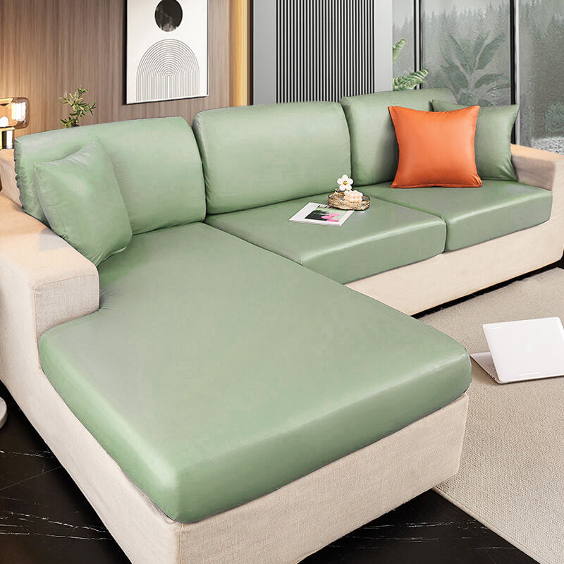 Packaging of a waterproof sofa protector cover, emphasizing its pet-friendly, easy-clean, and durable features.