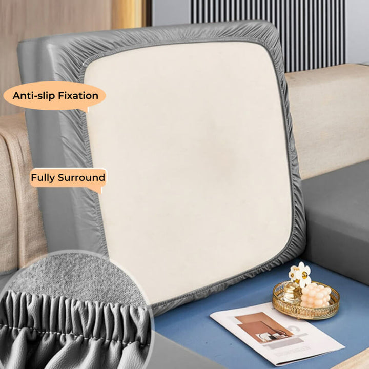Dog comfortably napping on a scratch-resistant sofa cover, showcasing its furniture protector qualities.