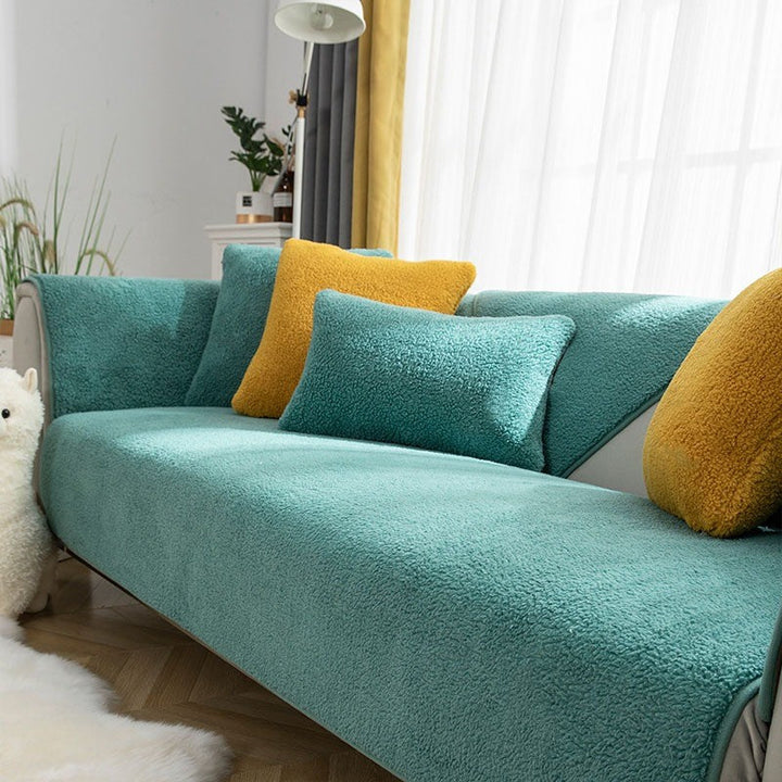 Living room sofa with new waterproof, non-slip fleece cover, offering comfort and protection. New4.