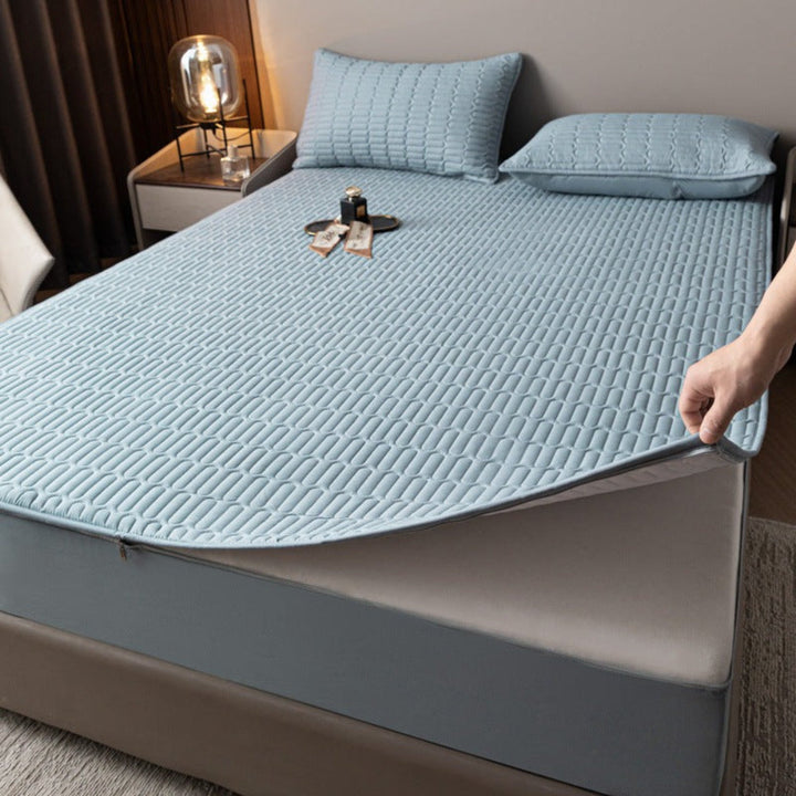 Corner detail of waterproof mattress protector, showcasing tight fit and soy fiber material