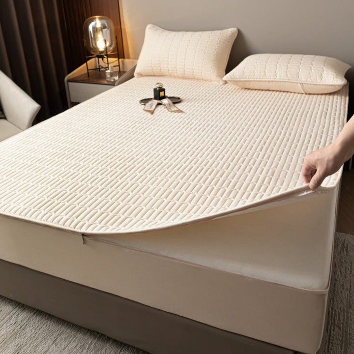 Bed with a waterproof zippered mattress protector, ensuring pet-friendly and clean bedding
