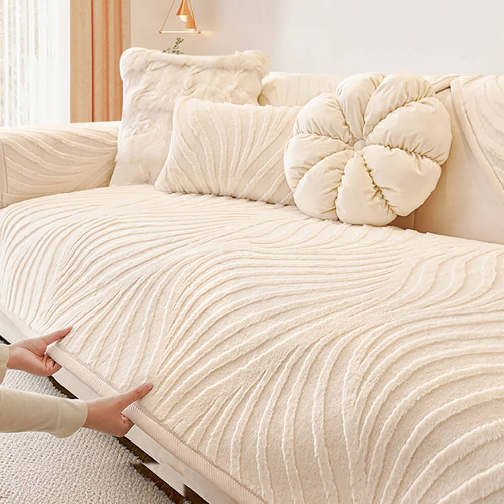 Wave textured plush non-slip sofa cover in light pink, adding a soft touch.