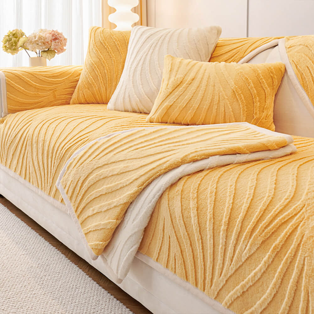 Close-up of wave textured plush non-slip sofa cover fabric, showing soft detail.