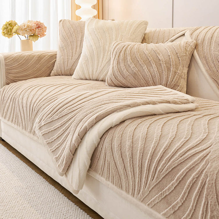 Non-slip wave pattern sofa cover in green, plush fabric for furniture protection.