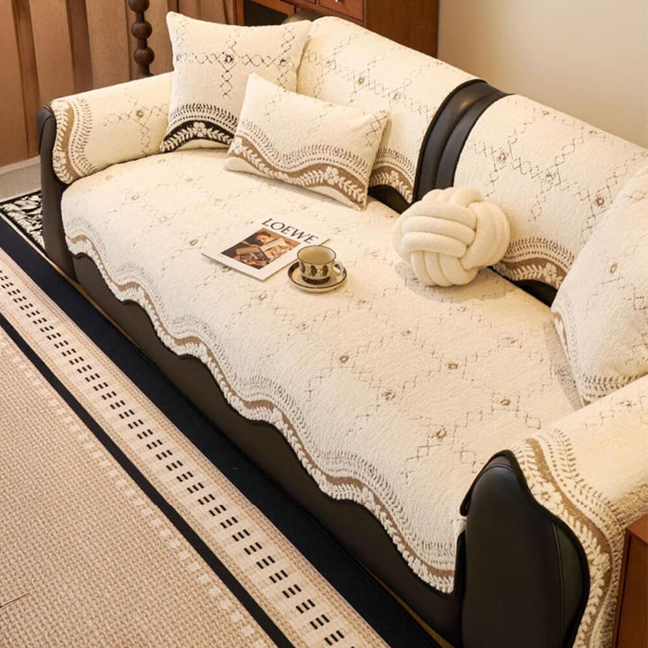 Anti-scratch wavy plush sofa cover on a three-seater couch, pet-friendly home decor