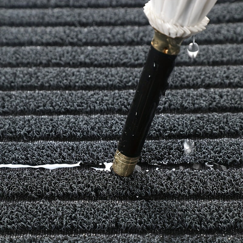 Indoor/outdoor entryway doormat. Weatherproof utility mat, highly durable & non-slip for clean floors.