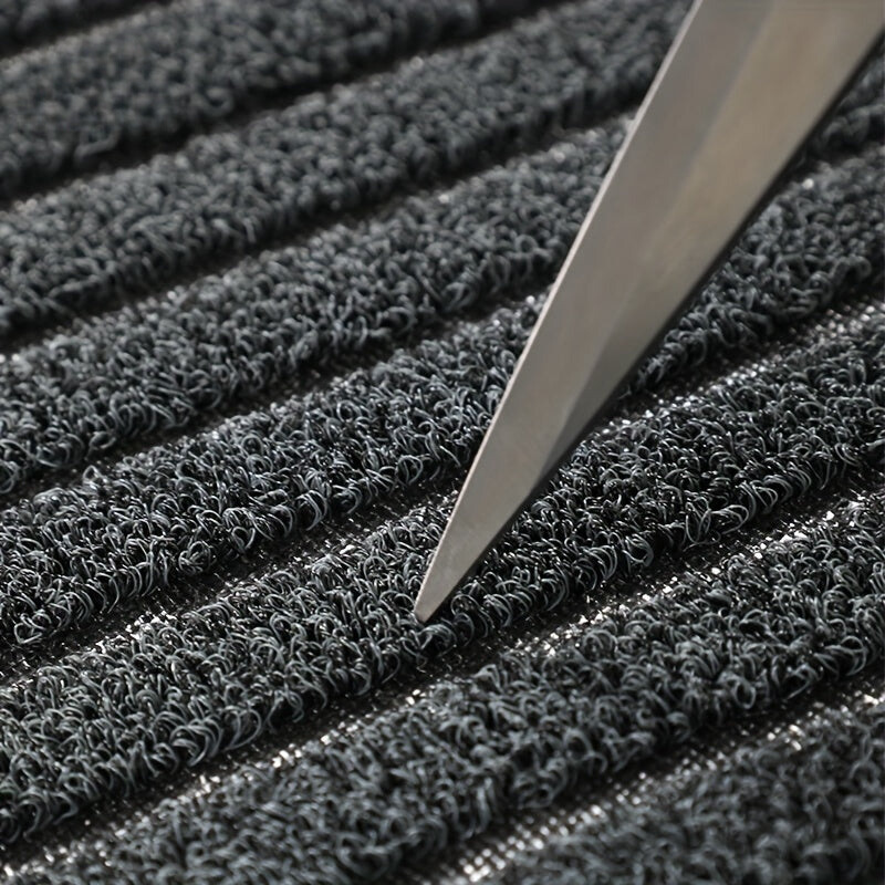 Heavy-duty dirt trapping doormat. Weatherproof floor mat for indoor & outdoor use. Enhances home decor.