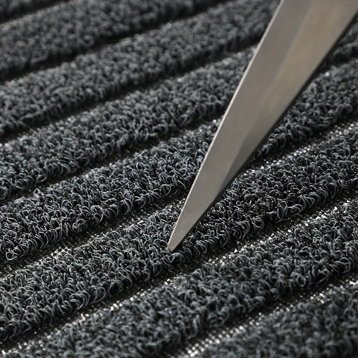 Heavy-duty dirt trapping doormat. Weatherproof floor mat for indoor & outdoor use. Enhances home decor.