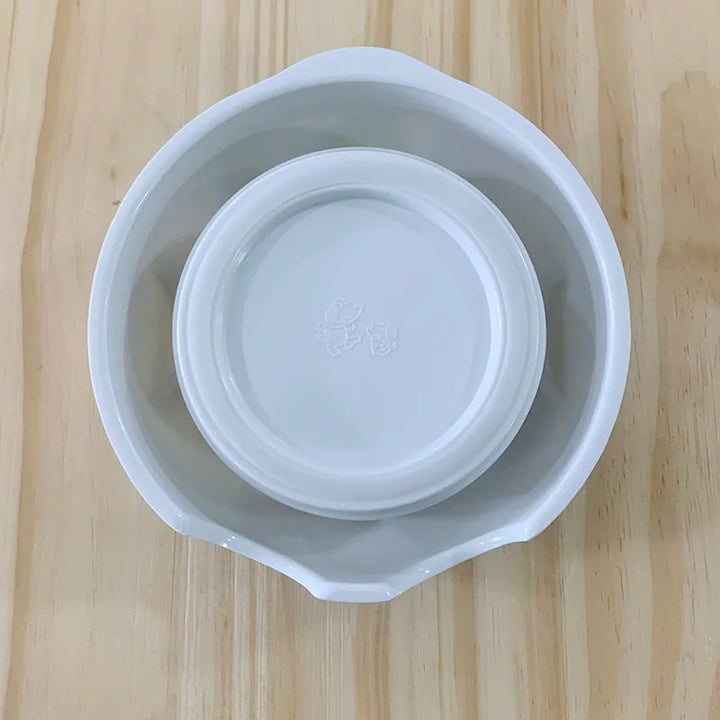 Charming ceramic pet bowl with an adorable dog graphic, ideal for daily dog food or water. Resilient and cute.