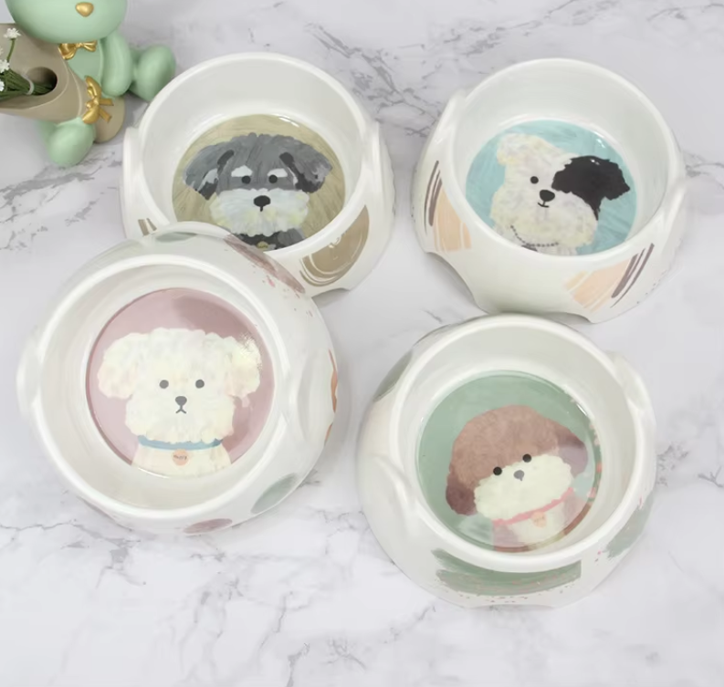 Durable ceramic dog bowl featuring an adorable cartoon dog, ideal for kibble or fresh water. Easy cleaning.