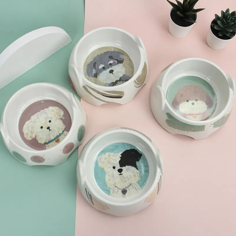 Pet supplies: Ceramic dog bowl with charming dog illustration, suitable for food or water. Heavy-duty construction.