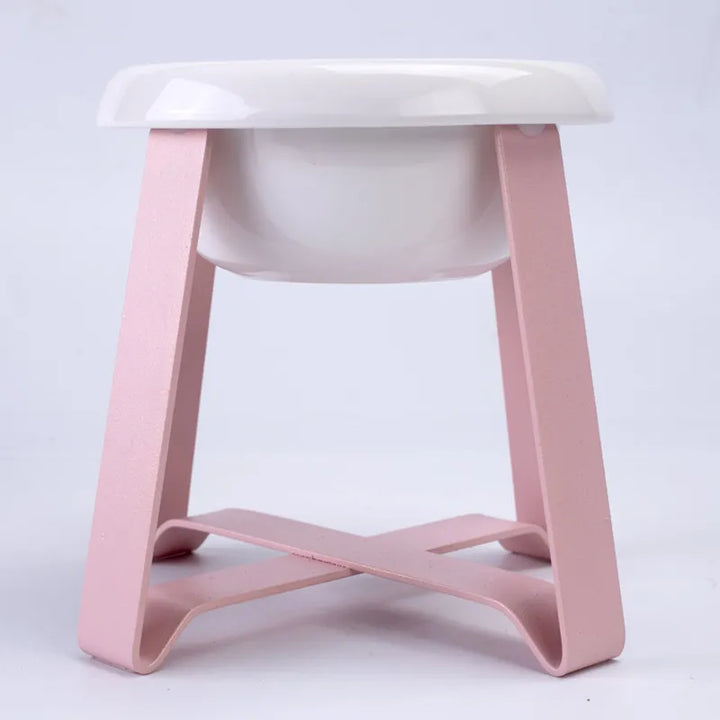 Raised dog feeder with white bowl and black metal stand for comfortable pet dining