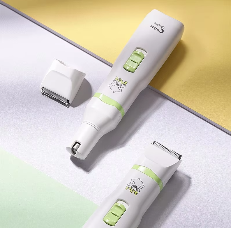 Unisex pet grooming kit with white electric clippers, ideal for dog and cat hair trimming.