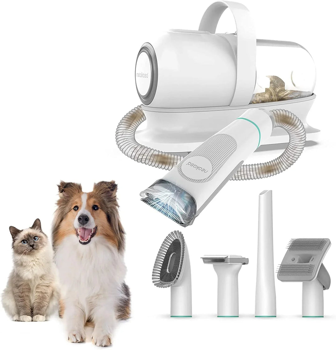 White ergonomic pet grooming vacuum kit with cordless trimmer, ideal for dog and cat shedding care.