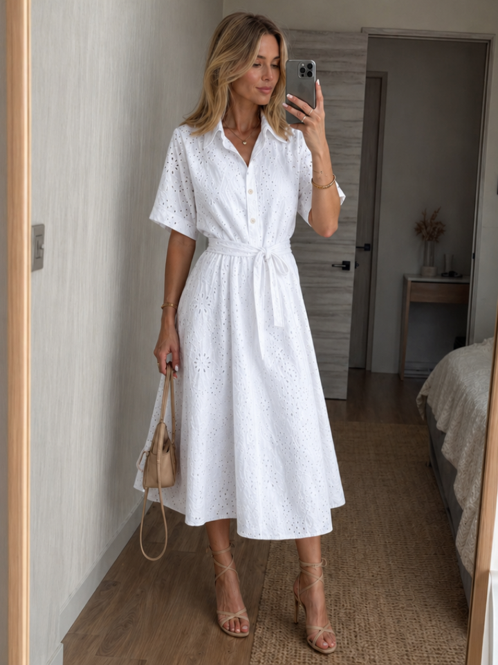 White eyelet midi shirt dress for women with elegant collar & tie-waist. Perfect summer fashion.