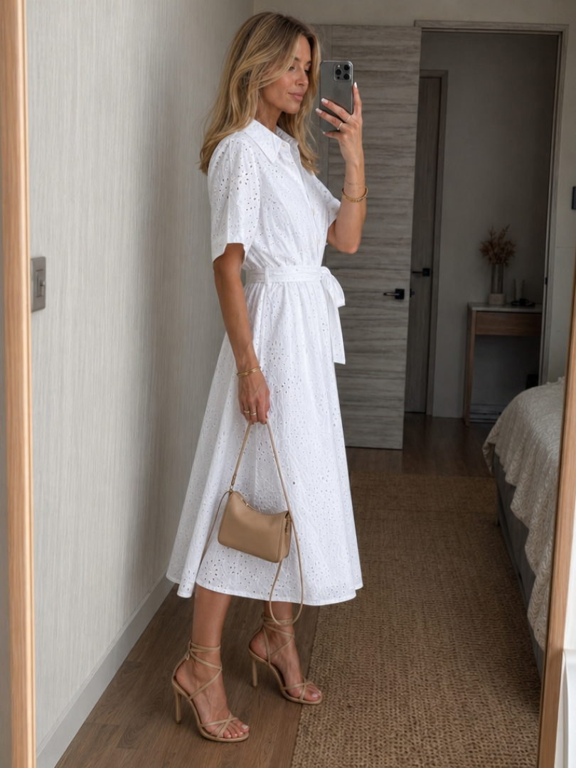 Women's versatile eyelet collared midi shirt dress with tie-waist. Ideal for day or evening wear.