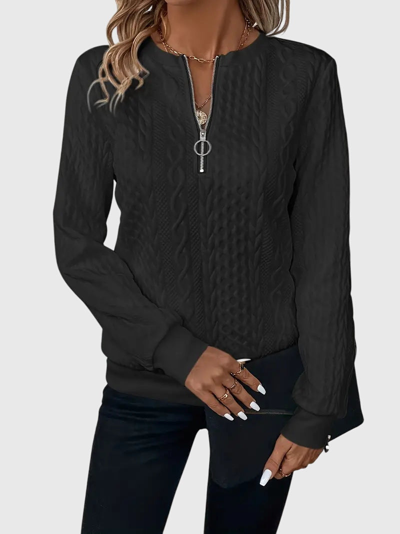 Black cable knit quarter-zip sweater. Harlow women's pullover. Elegant and warm for any occasion.