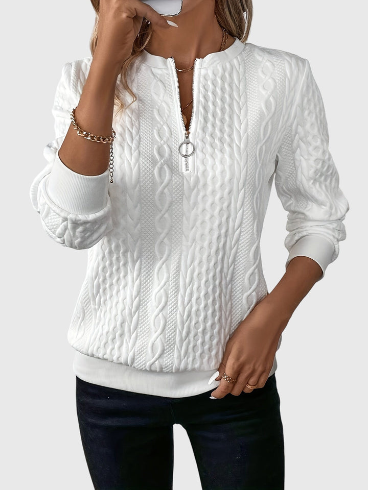 Black Harlow Cable Knit Quarter-Zip Sweater. Chic women's pullover, essential for versatile winter fashion.