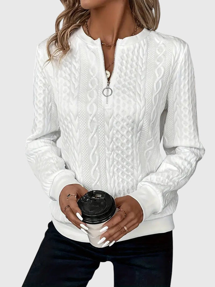 Blue Harlow Cable Knit Quarter-Zip Sweater. Stylish women's pullover, great for casual elegance.