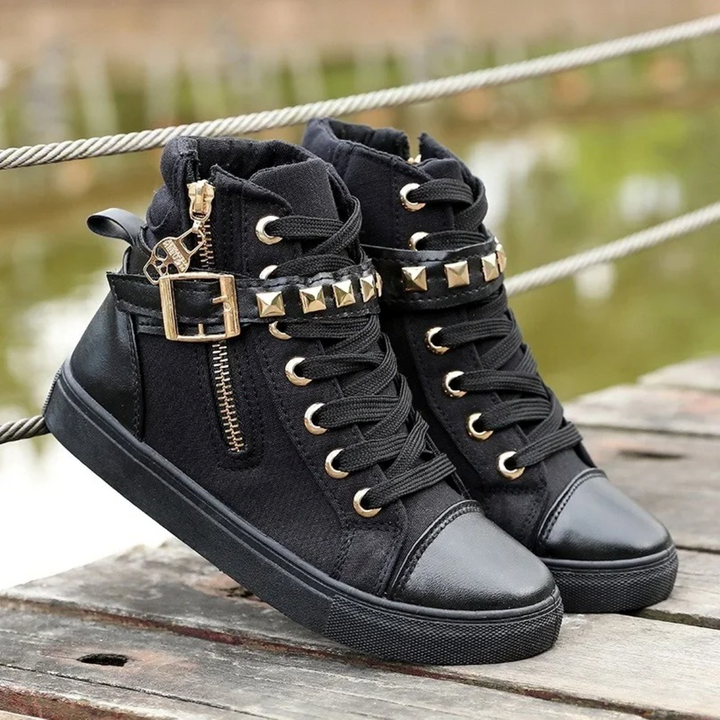 Modern white women's high-top sneakers, featuring a convenient zipper for easy on/off, perfect for casual wear.