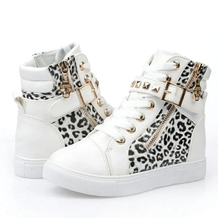 Stylish white high-top women's sneakers with side zipper closure, providing fashion-forward appeal and support.
