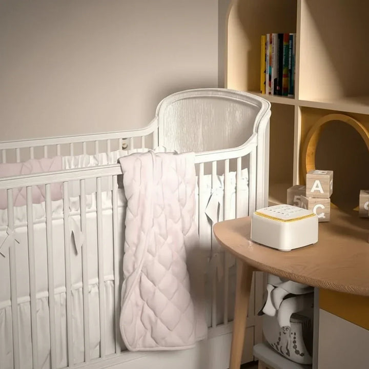 Portable white noise sound machine, perfect for travel, nurseries, and offices. Compact sleep aid for all ages.
