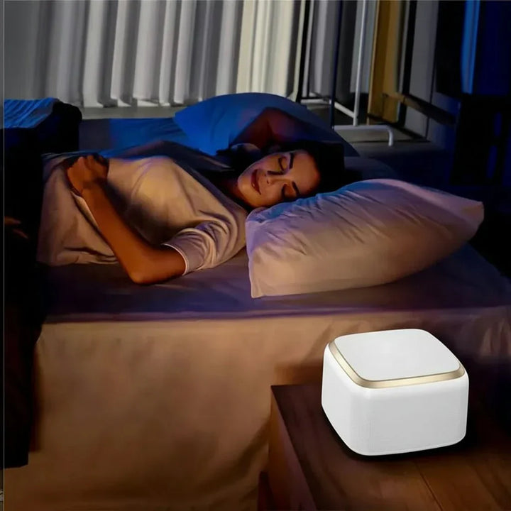 Relaxing sound therapy machine promoting deep, restful sleep. Soothes with white noise, fan, and nature sounds.