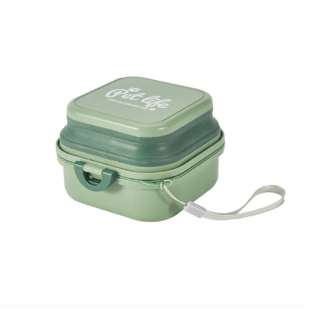 Open silicone pet supply organizer showing compartments for various pet grooming tools
