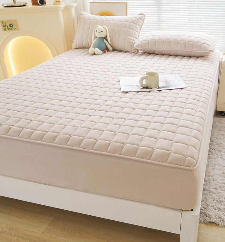 Close-up of waterproof mattress protector fabric, highlighting soft, breathable, and quiet material.