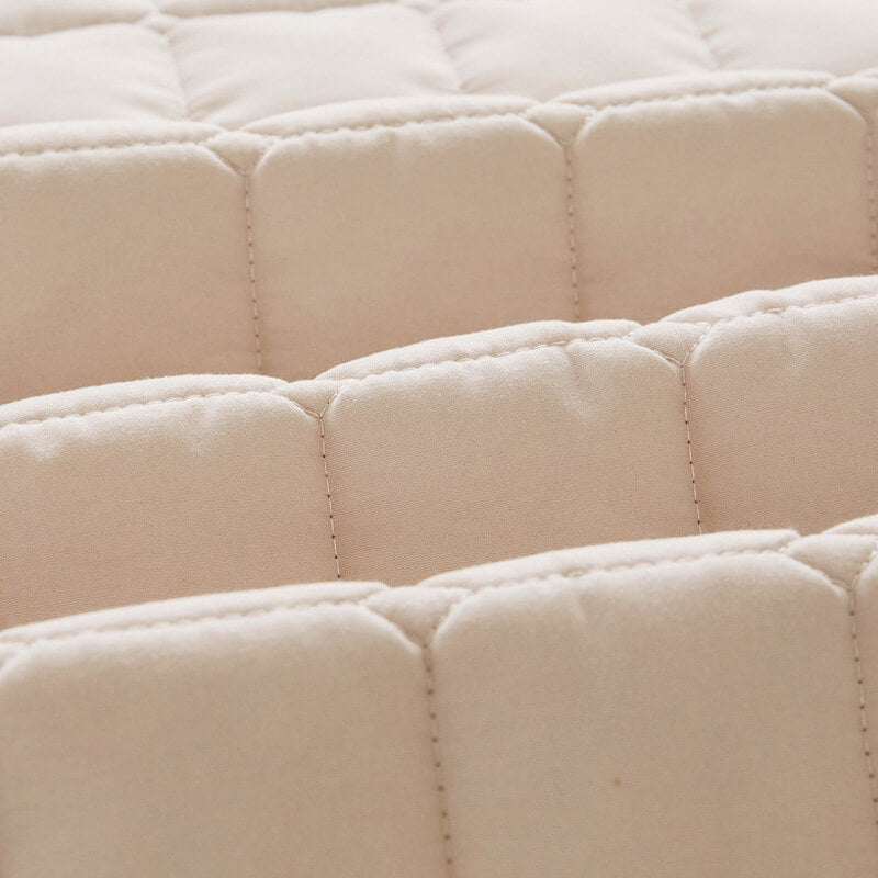 Packaging shot of a waterproof mattress protector, emphasizing protection and hygiene for bedding.