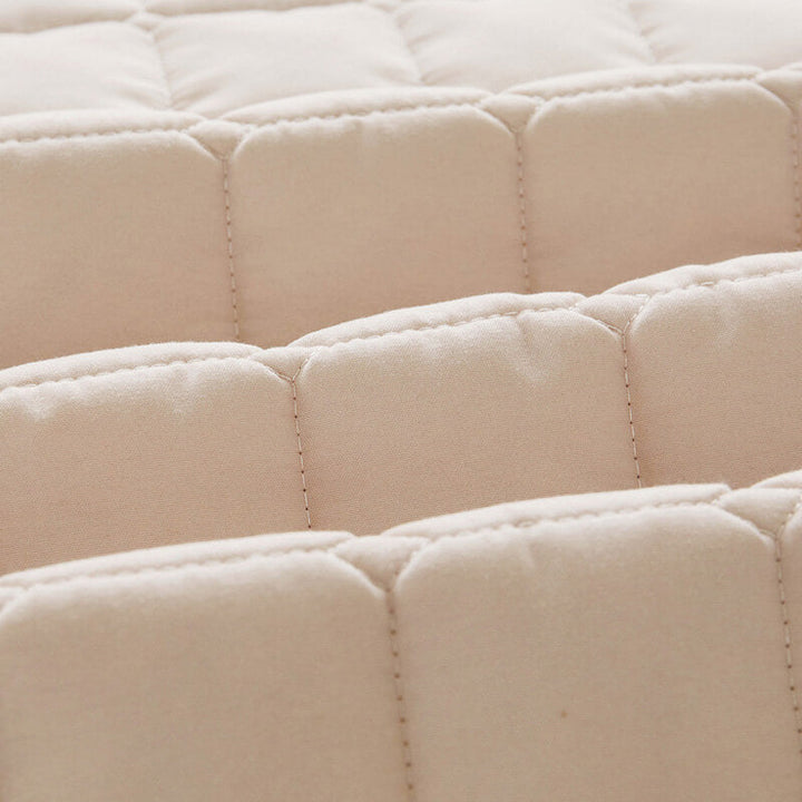 Packaging shot of a waterproof mattress protector, emphasizing protection and hygiene for bedding.