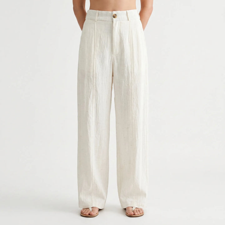 Relaxed fit wide-leg summer pants for women, mid-rise & flowy. Versatile for casual comfort or elegant resort wear.