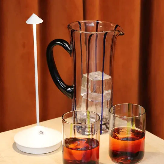 Portable dimmable LED light, wireless table lamp. Rechargeable, perfect for outdoor events & home decor.