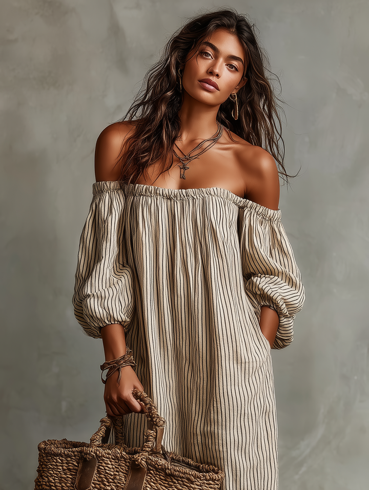 Close-up of a striped off-shoulder maxi dress featuring elegant puff sleeves, designed for women's casual wear.