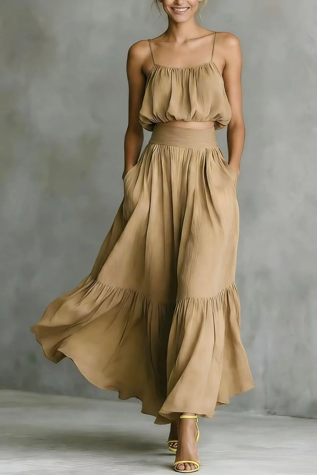 Elegant women's spaghetti strap crop top & ruffle hem maxi skirt set. Perfect holiday resort and beach outfit.